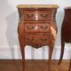 Lot of two rosewood and marble bedside tables
