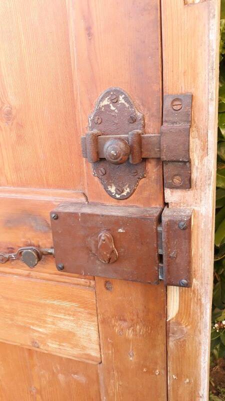 Front door and its frame, translucent glass windows, early 20th century