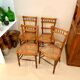 4 chaises en bois et cannage