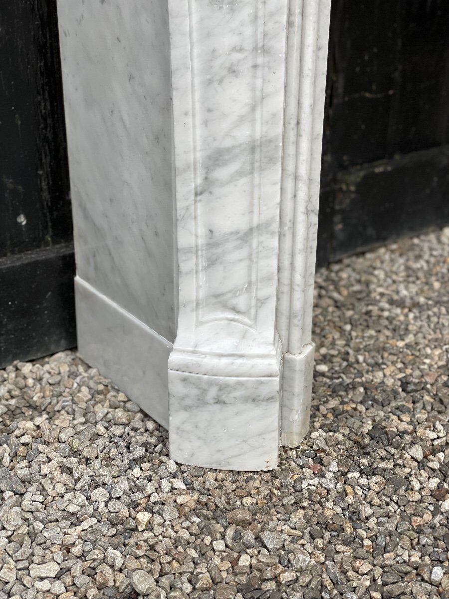 Louis XV style fireplace in Carrara marble