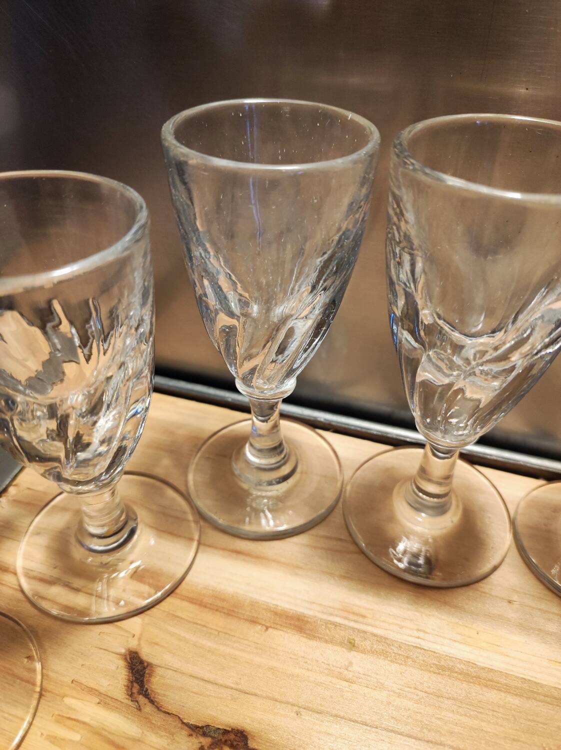 12 small twisted bistro glasses, 19th century