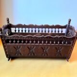 Carved wooden dolls cradle