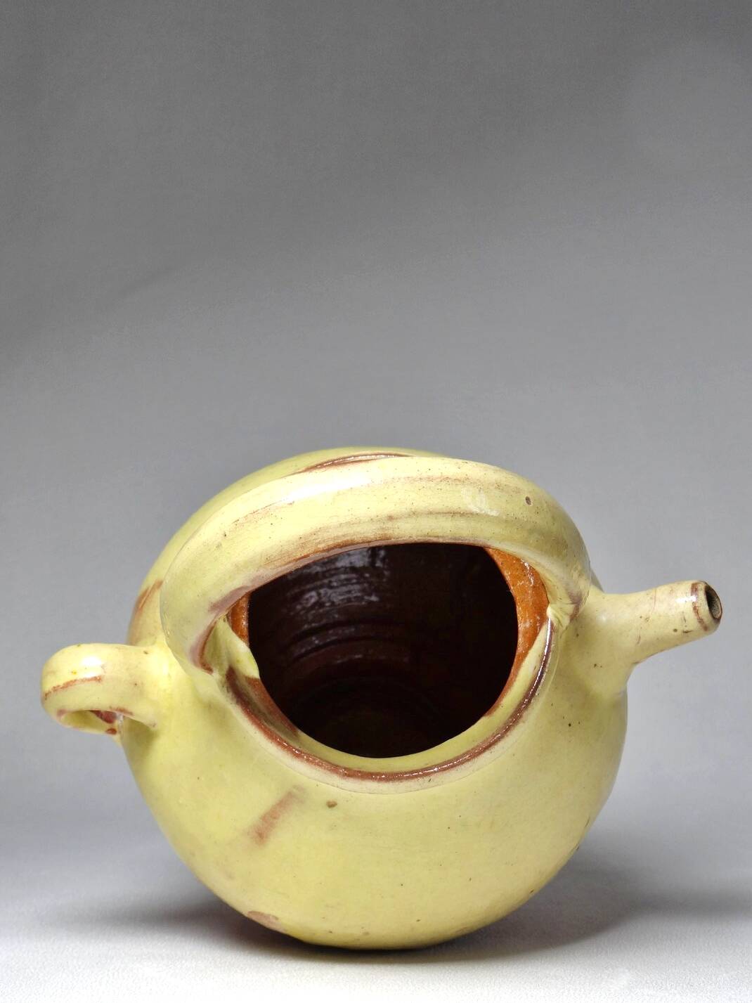 Small vintage pale yellow enamelled terracotta goat jug