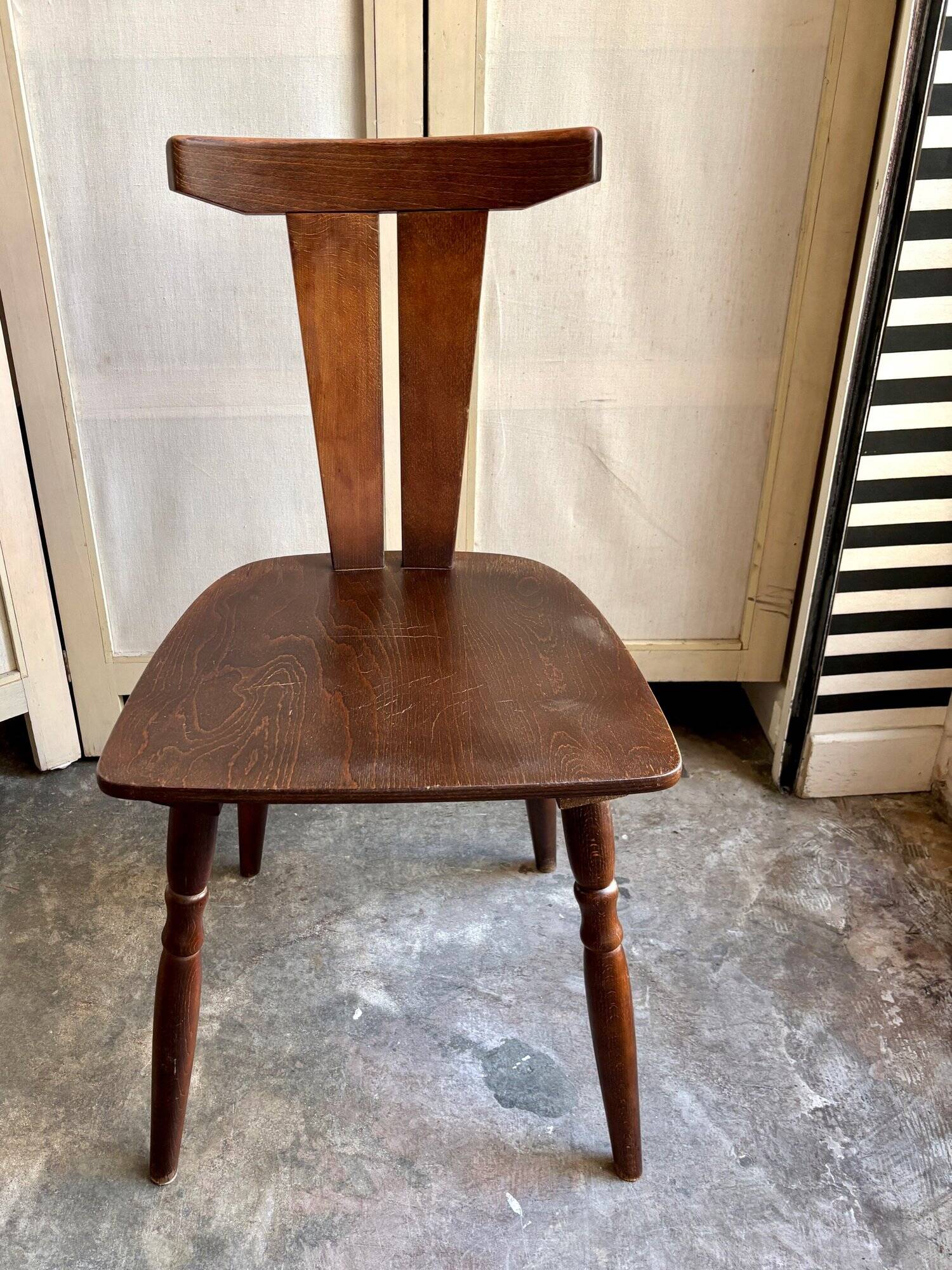 Brutalist chair in dark wood