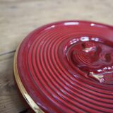 Vintage burgundy duck trivet with gold edging