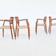 Niels Otto Moller model 66 armchairs teak and paper cord Denmark 1974