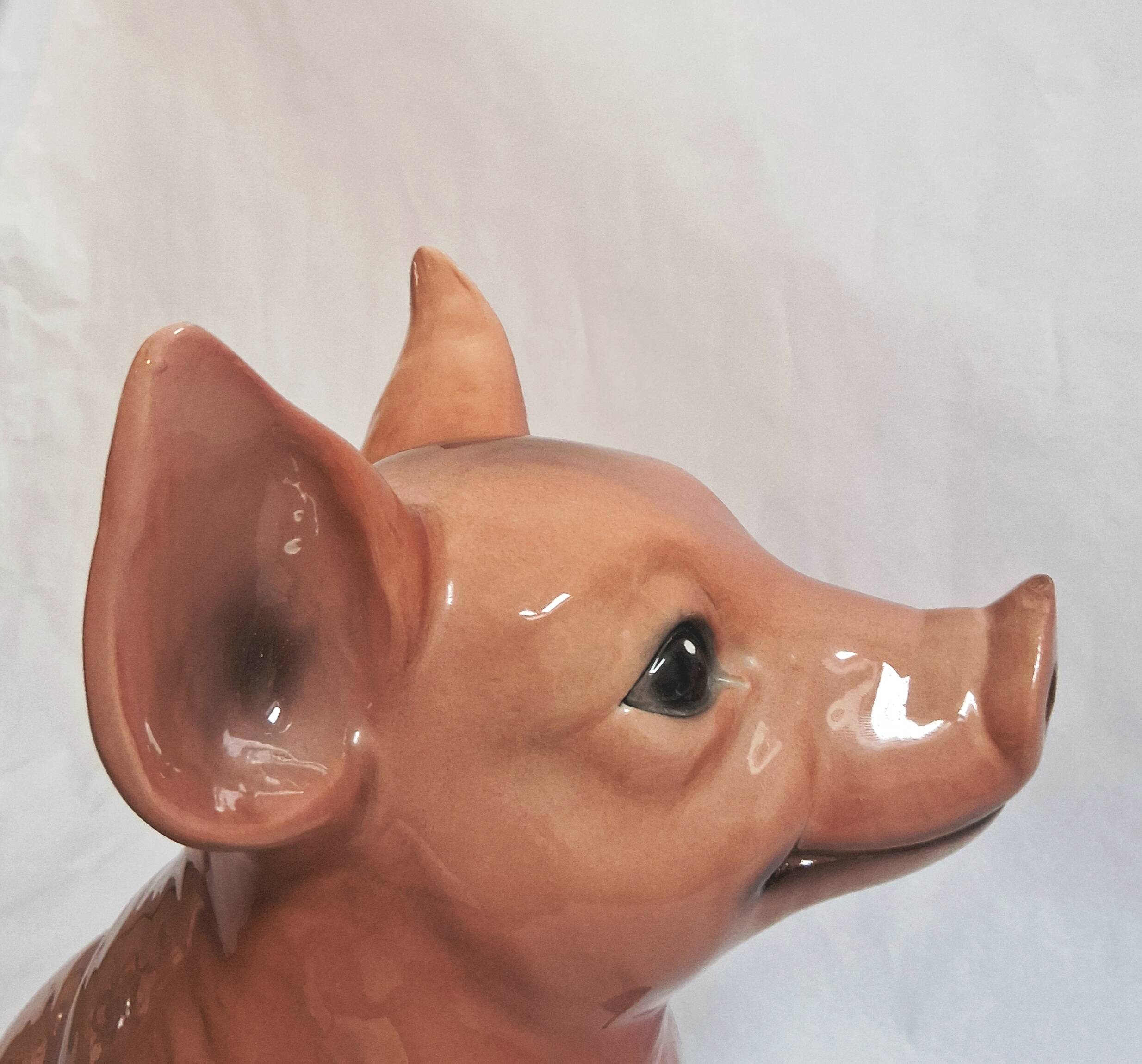 Beautiful, handcrafted porcelain figurine of a piglet, made by Capodimon.