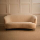 Curved sofa in the style of Maison & Jardin, 1940