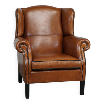 Very beautiful sheepskin leather wingback armchair with stunning details