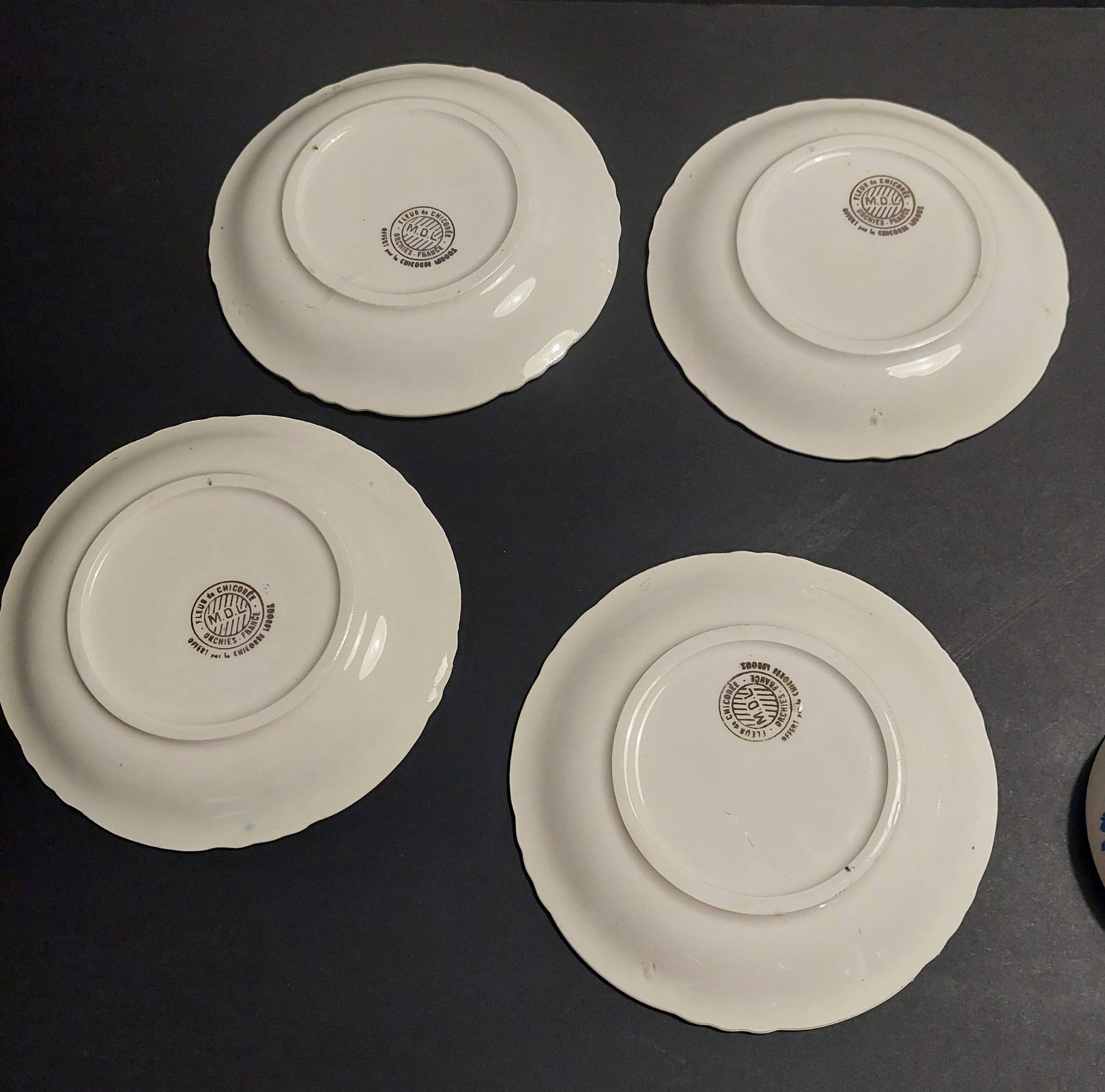 Series of four Orchies earthenware cups with chicory flower decoration