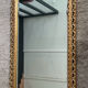 Ancien miroir en bois doré et verre biseauté