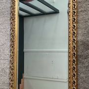 Ancien miroir en bois doré et verre biseauté