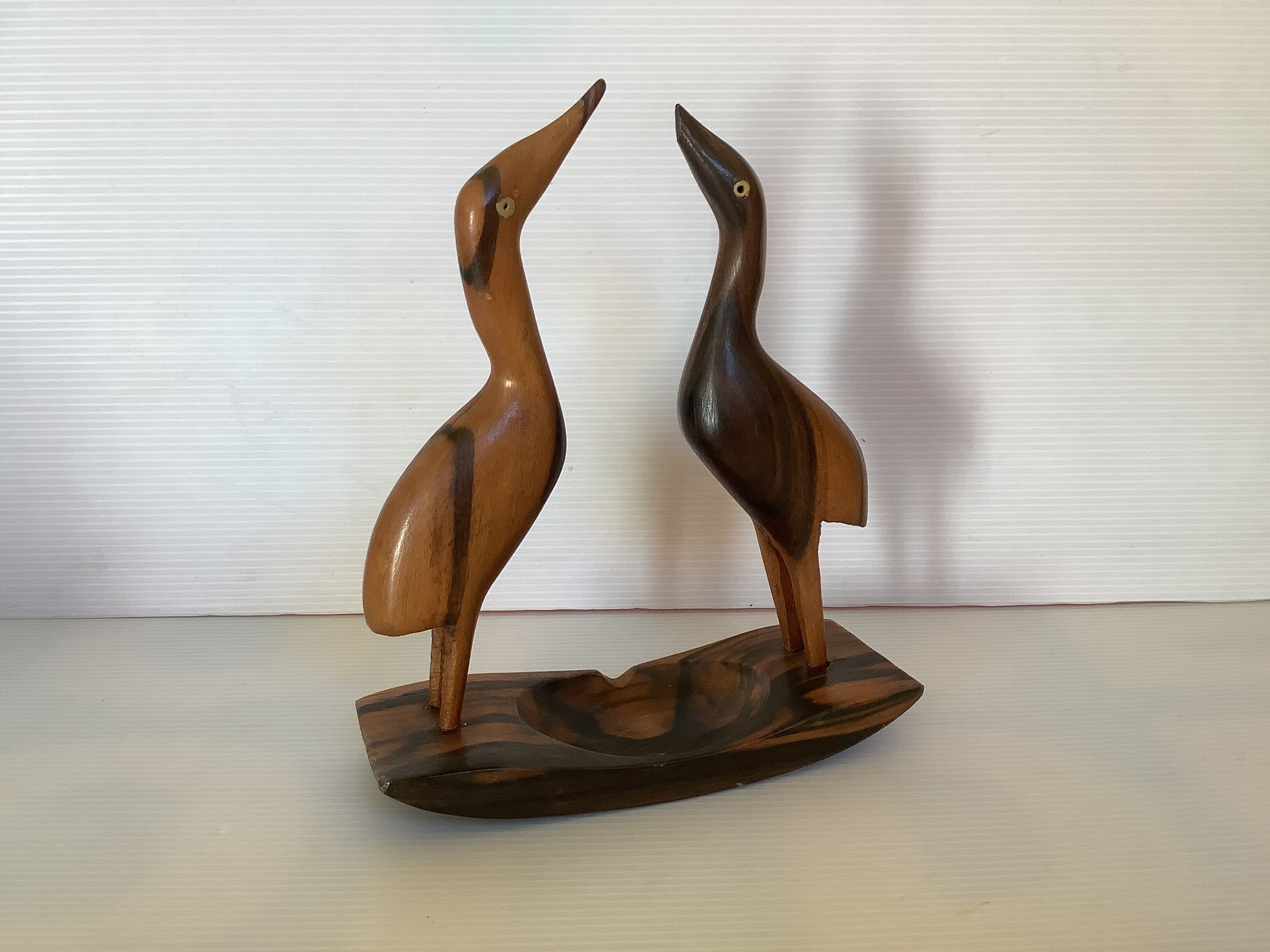 Empty ashtray wooden bird pocket