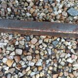 Solid wood living room coffee table with patinated metal legs