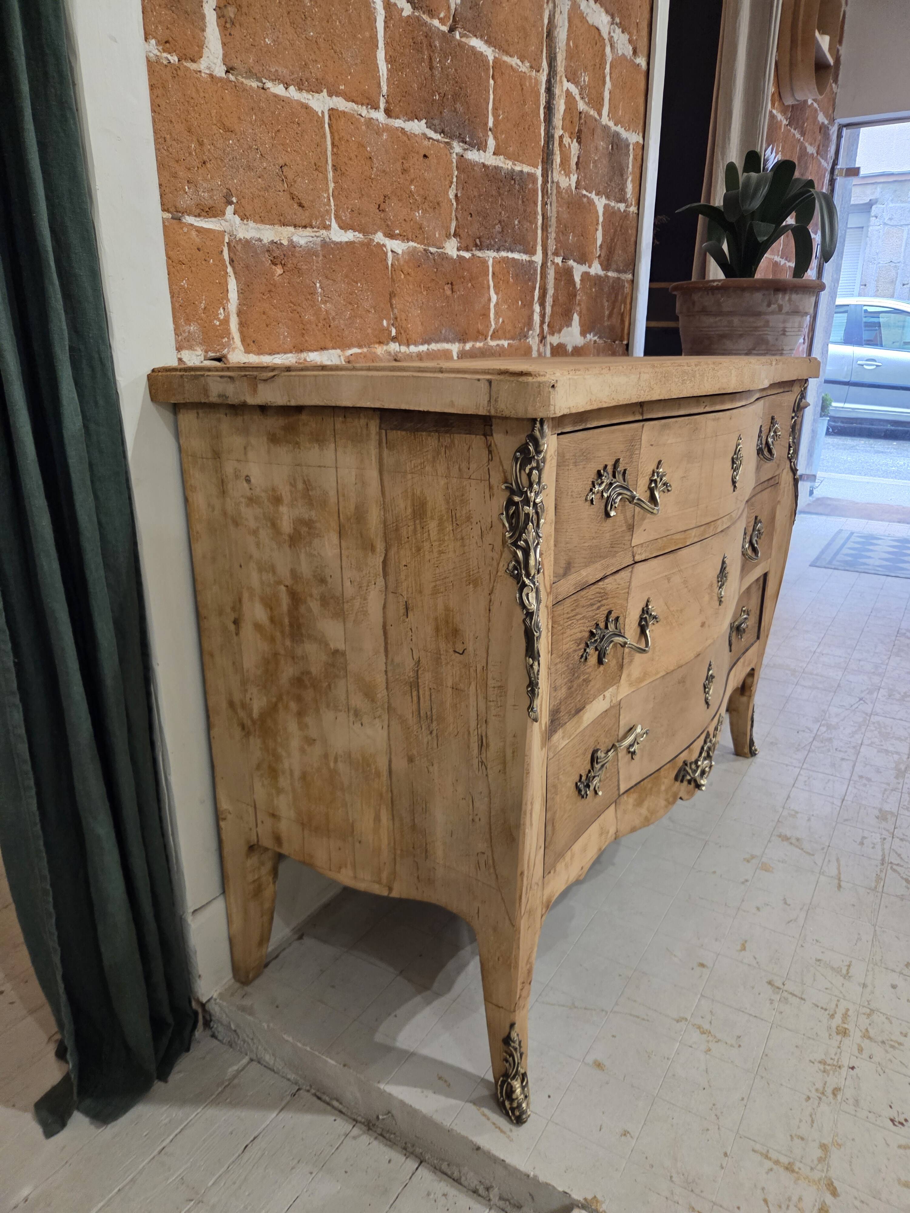 Stripped chest of drawers with bronze handles