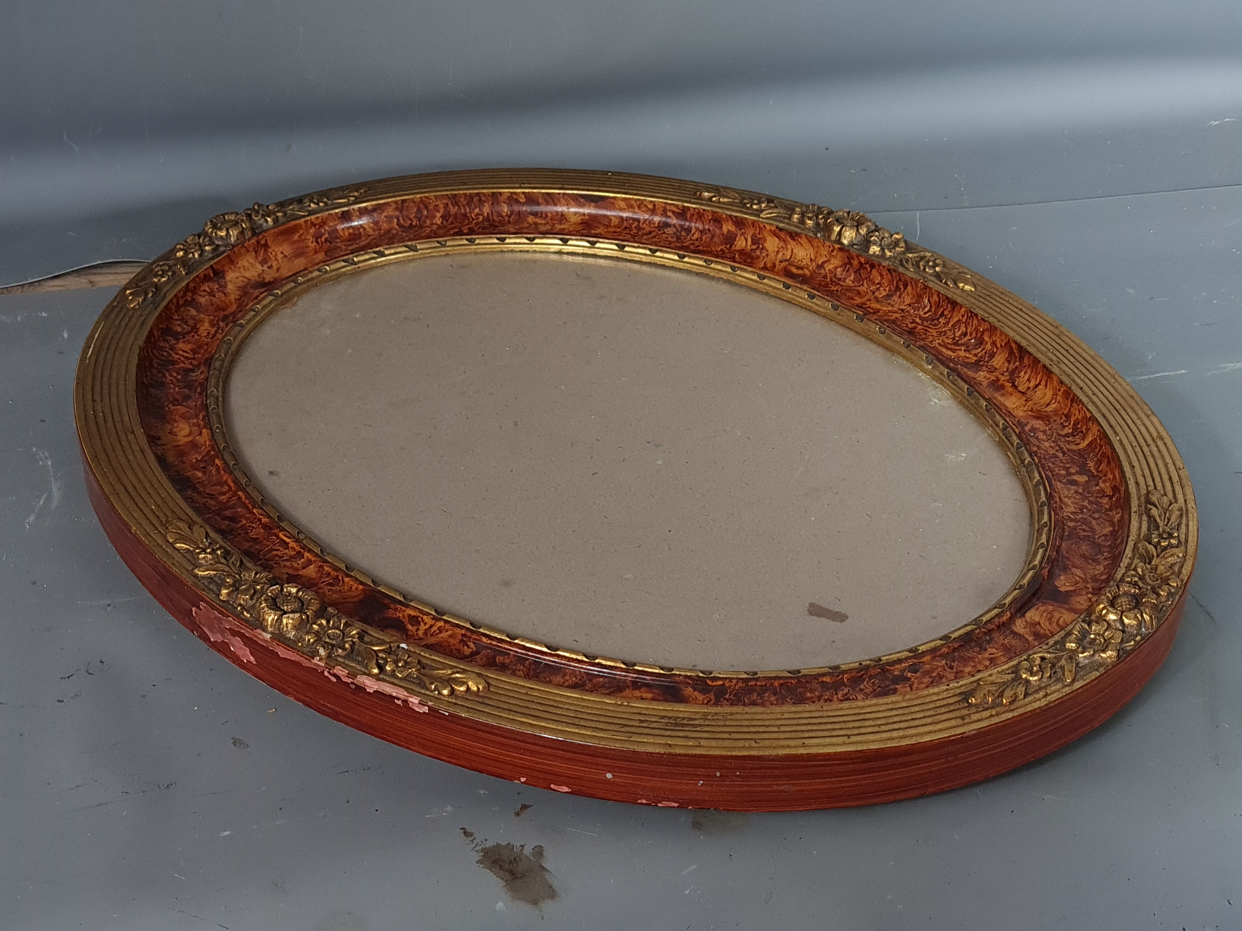 Old oval frame gilded stucco wood