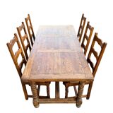 Large farmhouse table made of solid wood.