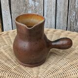 Signed stoneware pitcher