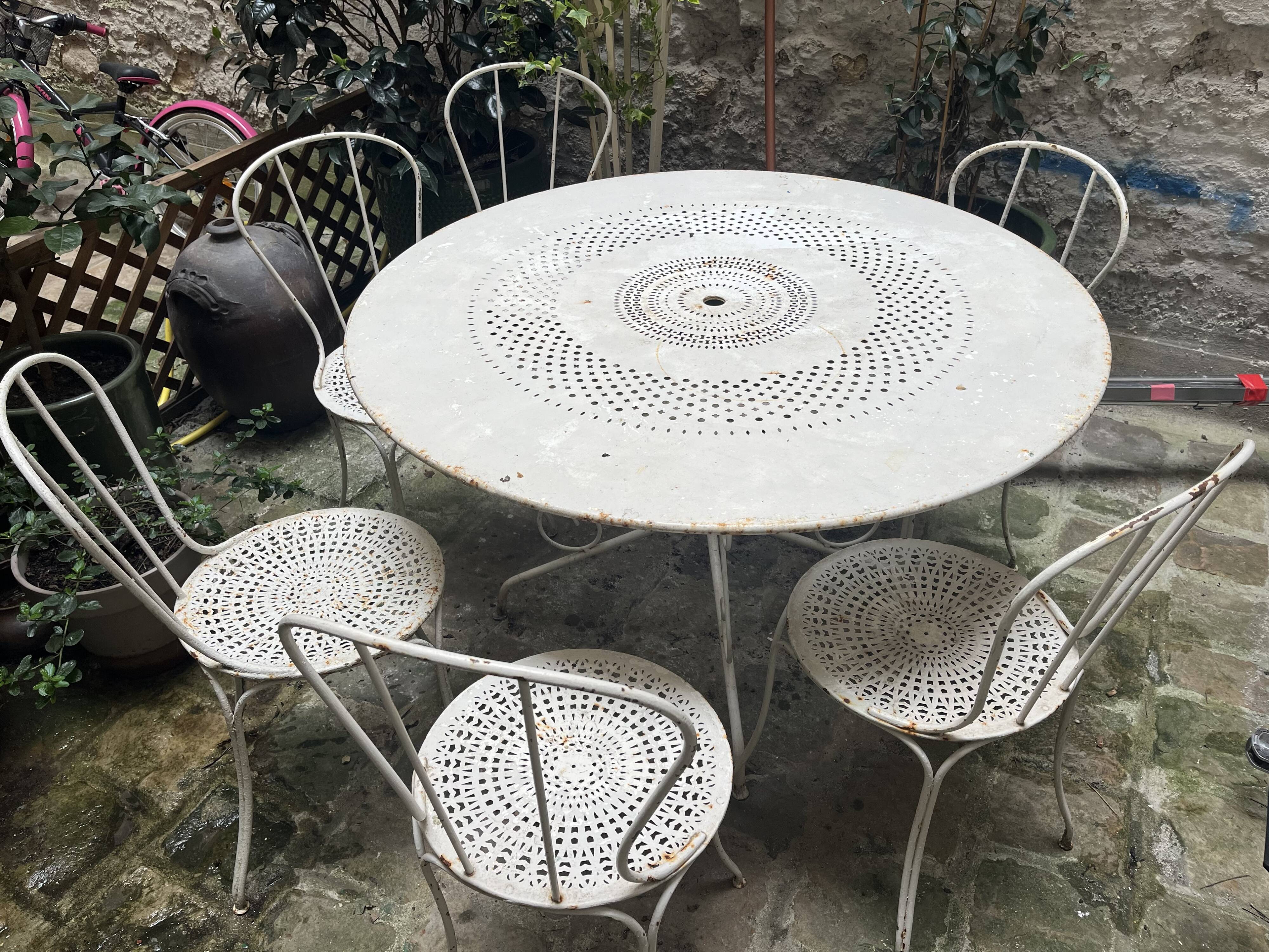 Garden table + 6 antique chairs