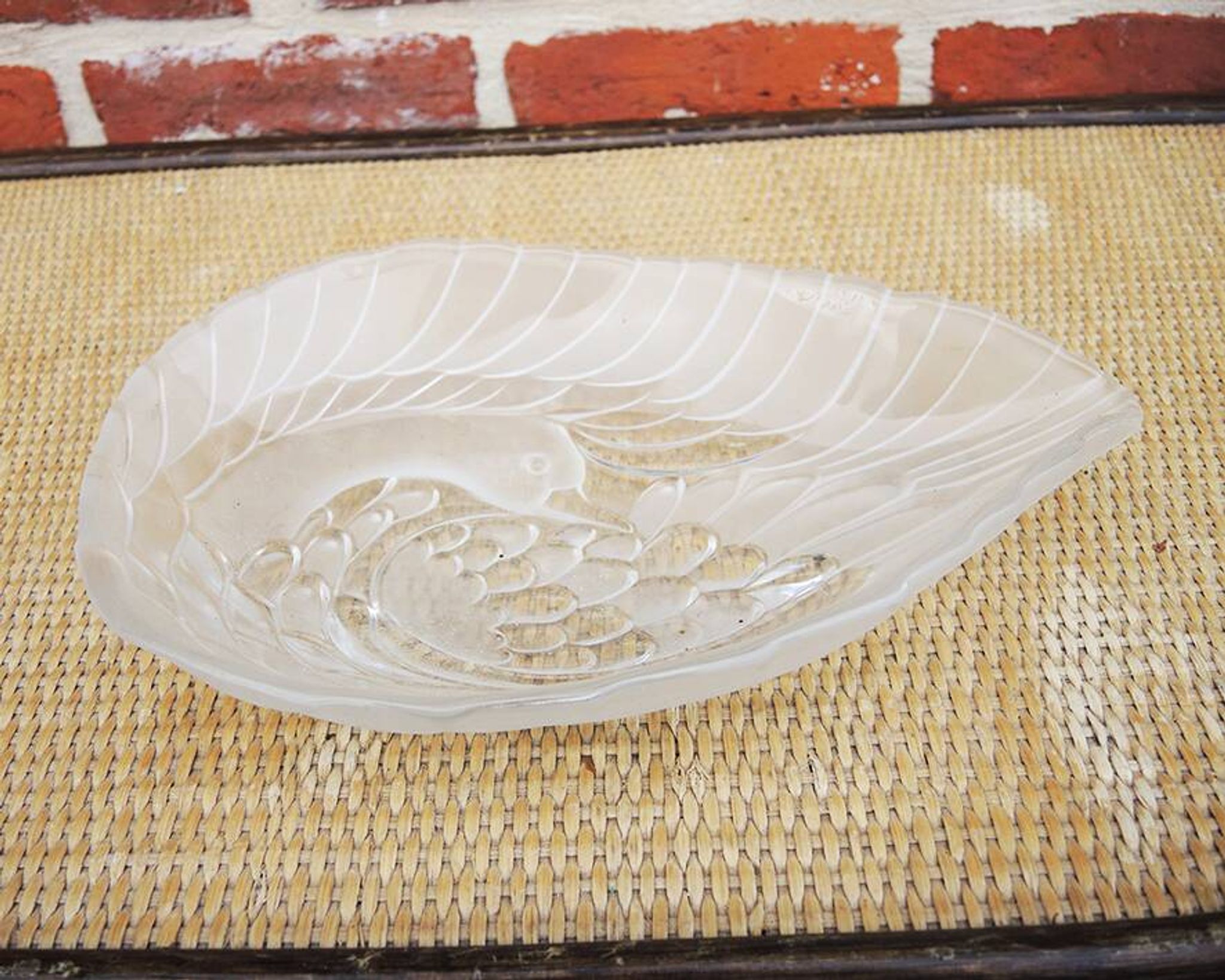 Antique glass bowl with swan decoration