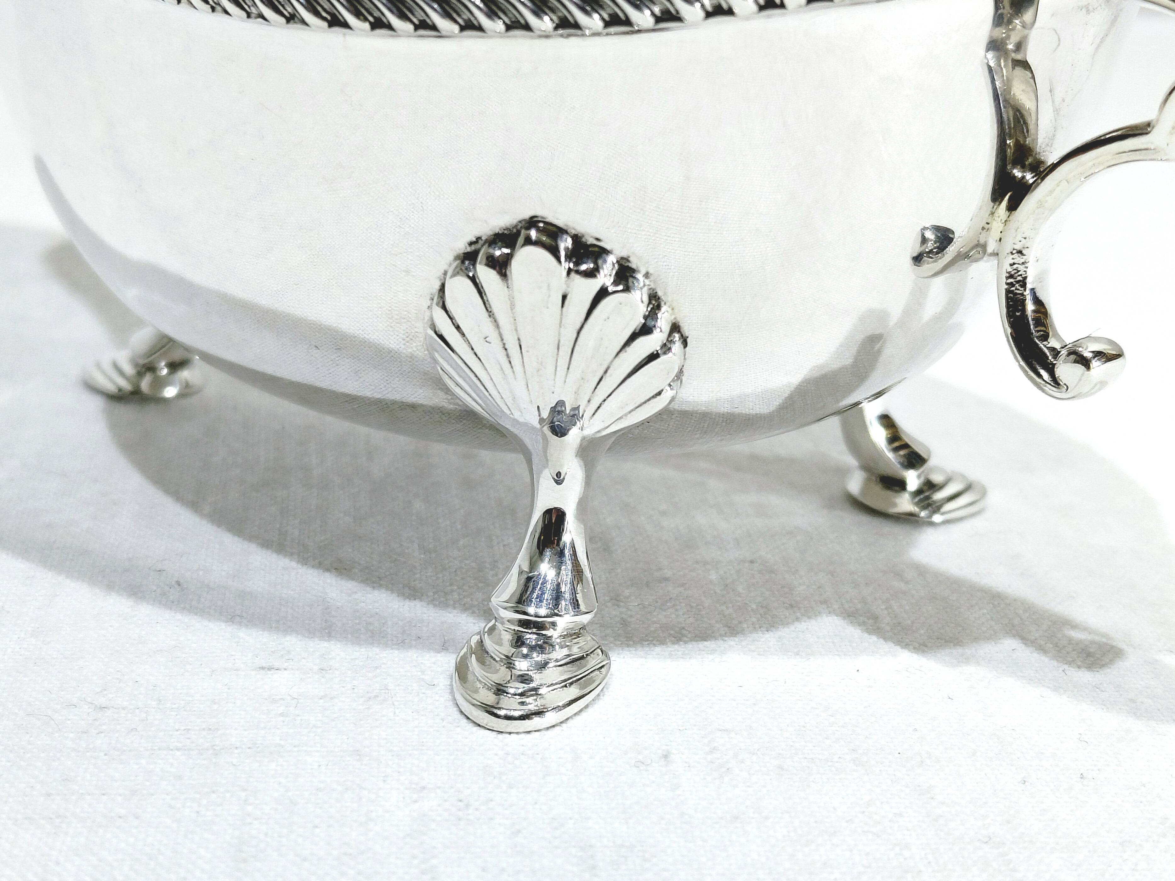 Silver sauceboat, England