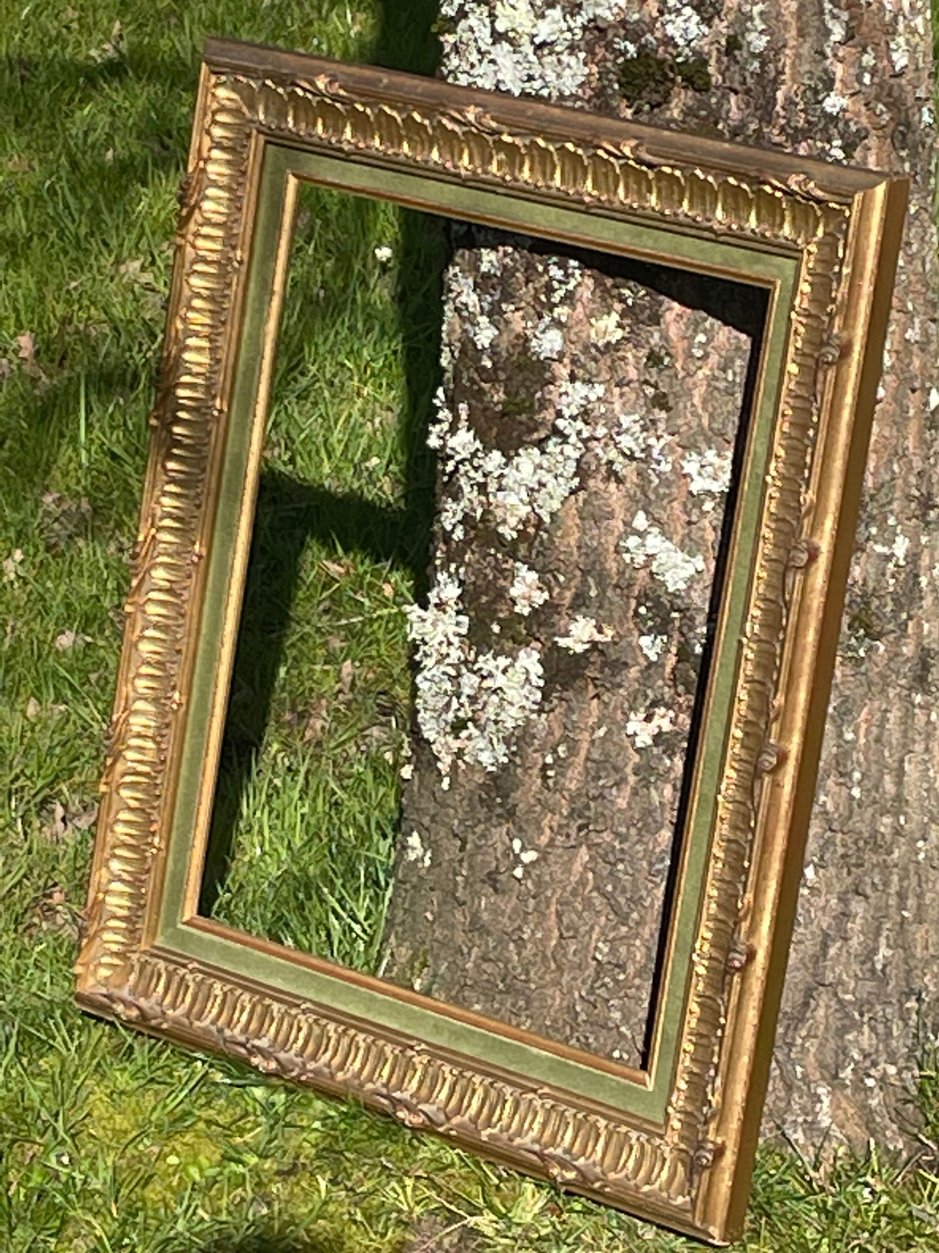 Frame carved wood and gilded stucco