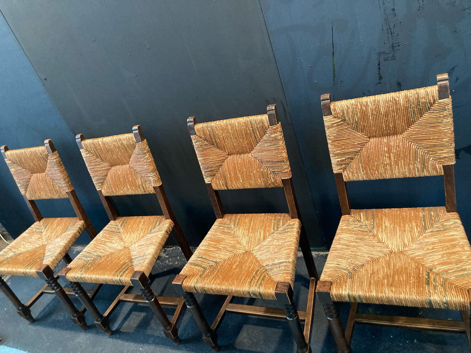 Four straw chairs