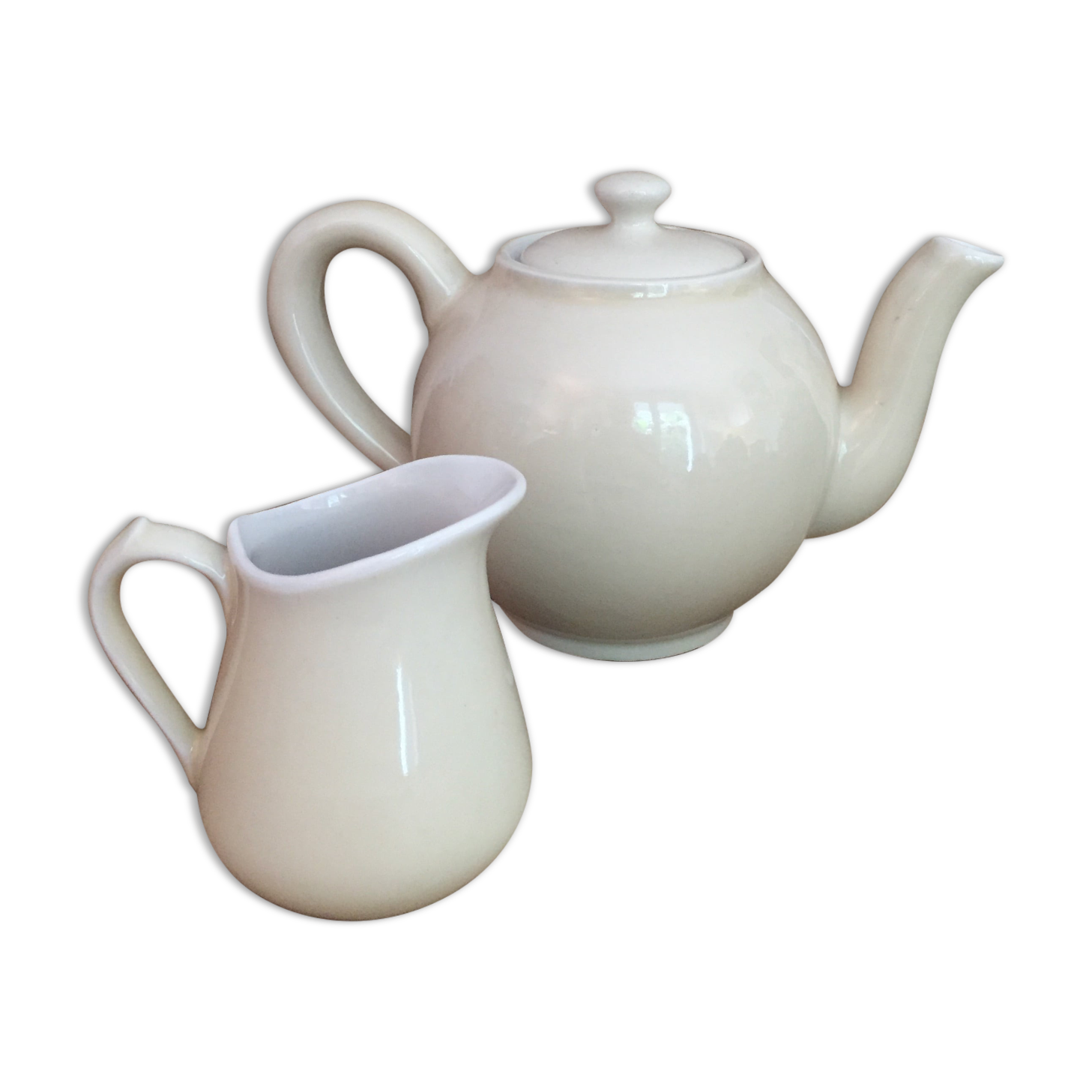 Teapot and vintage milk jar