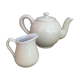 Teapot and vintage milk jar