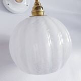 Brass and speckled glass wall lights from Clichy