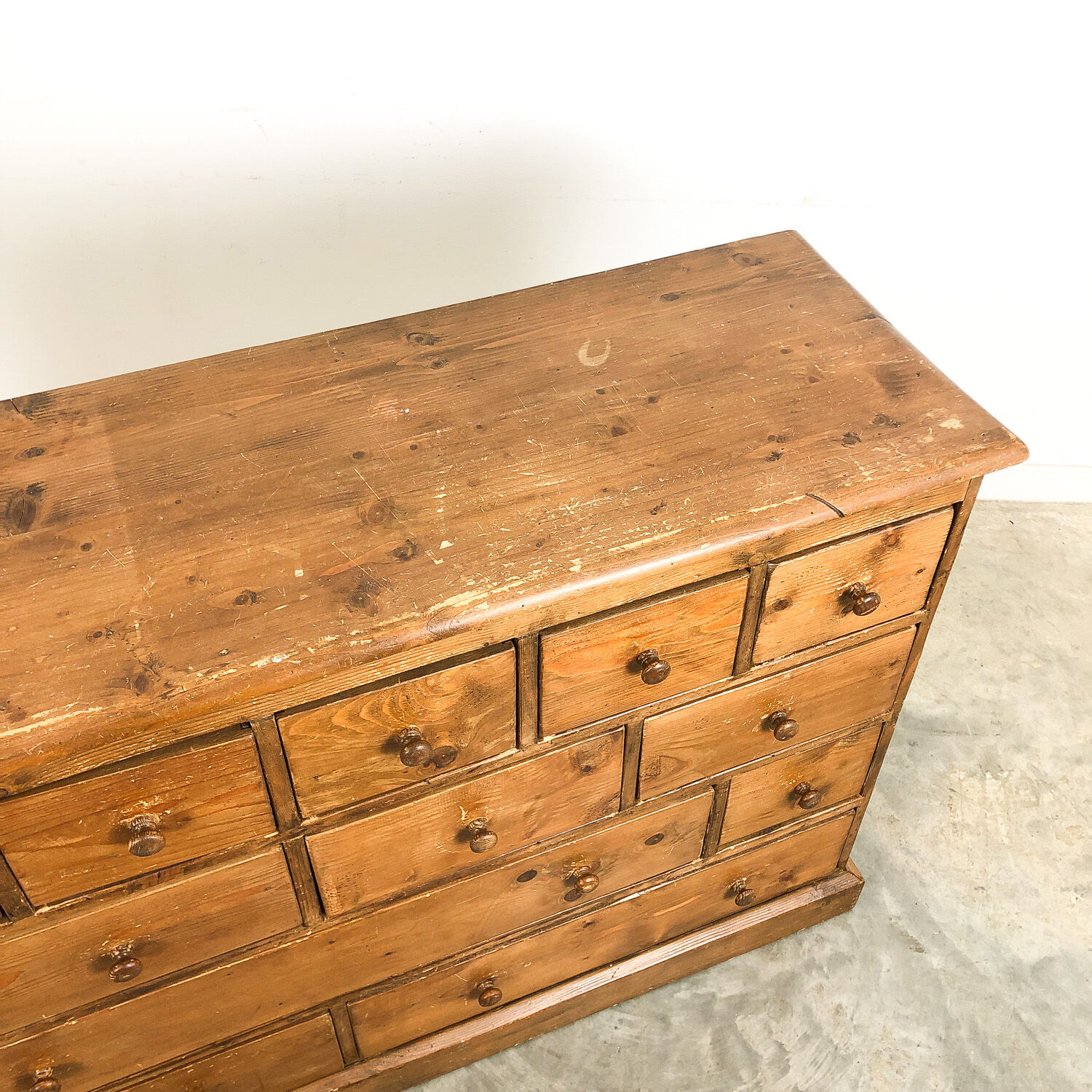 Pine bank of drawers