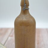 Small wooden sandstone bottle