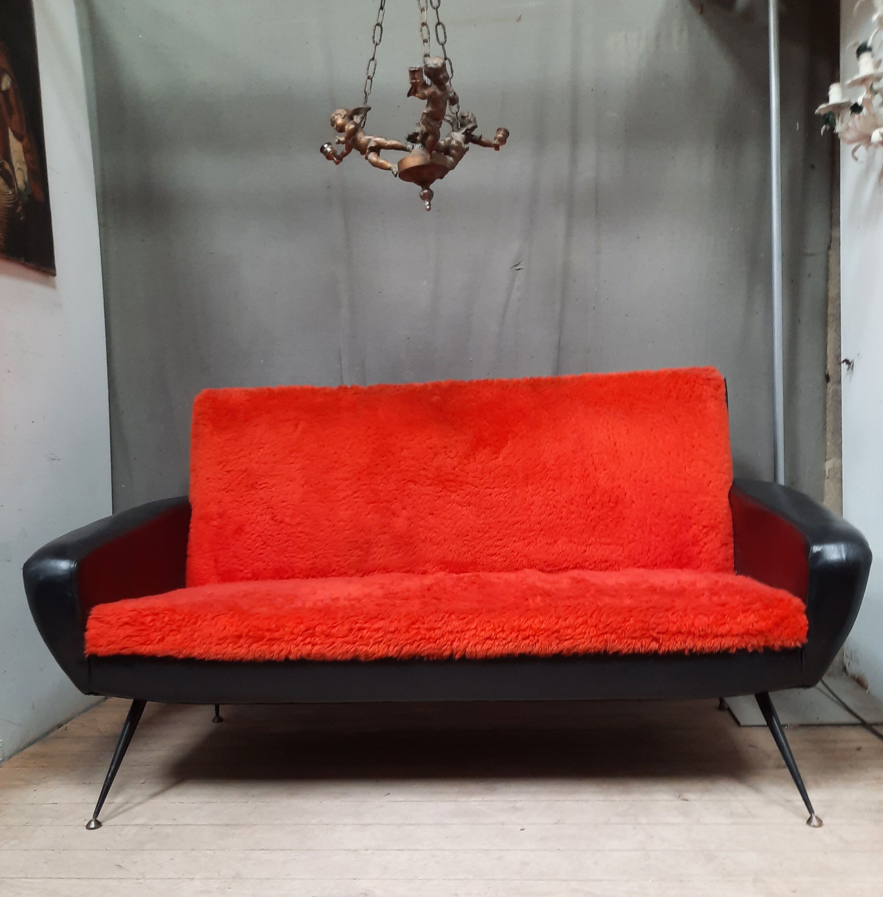 Canapé vintage pieds compas