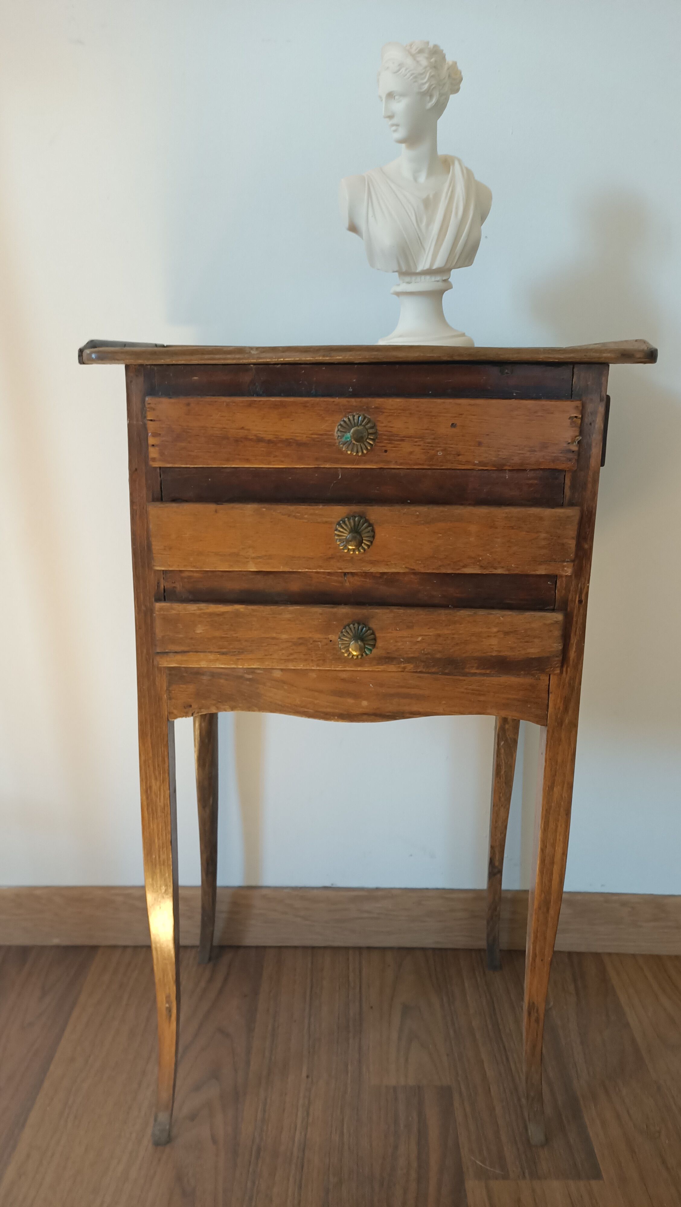 Bedside table with secret drawer