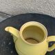 Teapot, yellow earthenware coffee maker and vintage gold edging
