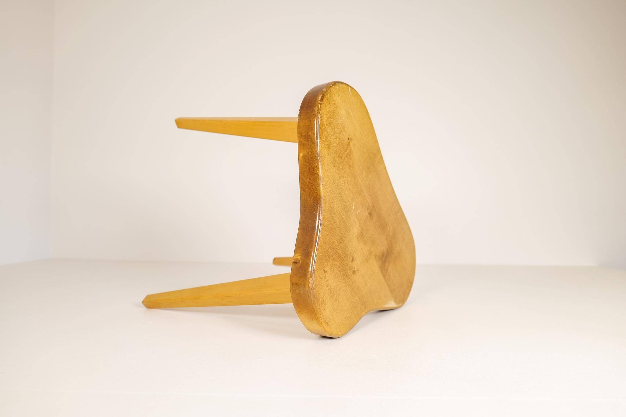 Modern Swedish Scandinavian stool in lacquered birch, 1970s.