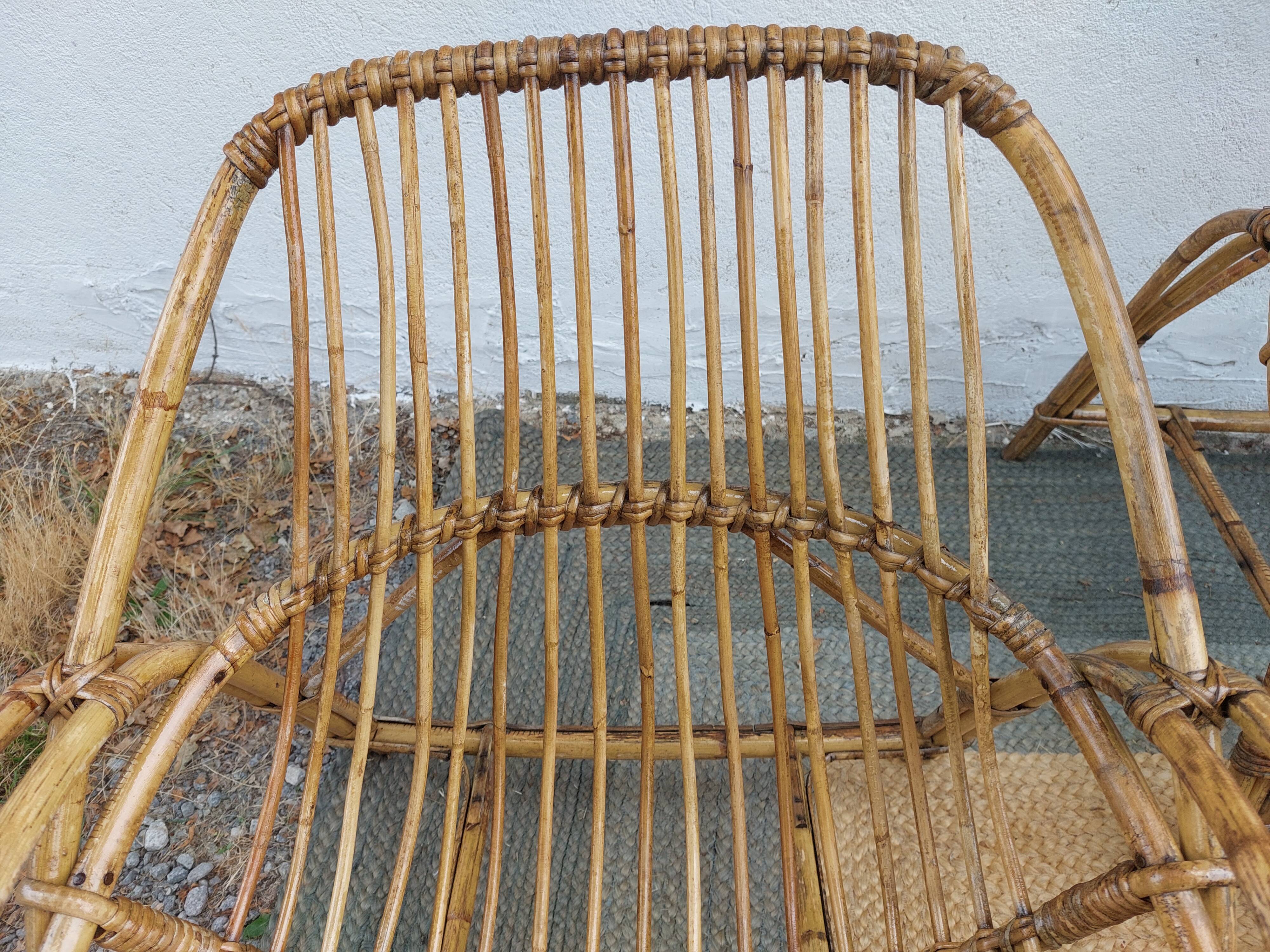 4 armchairs and a coffee table made of rattan and bamboo wood, vintage.