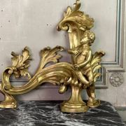 Paire de chenêts en bronze ciselé et doré d'après un modèle de Jacques Caffieri, Paris XIXème