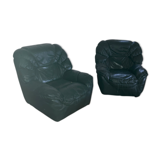 Pair of club chairs in green leather