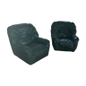 Pair of club chairs in green leather