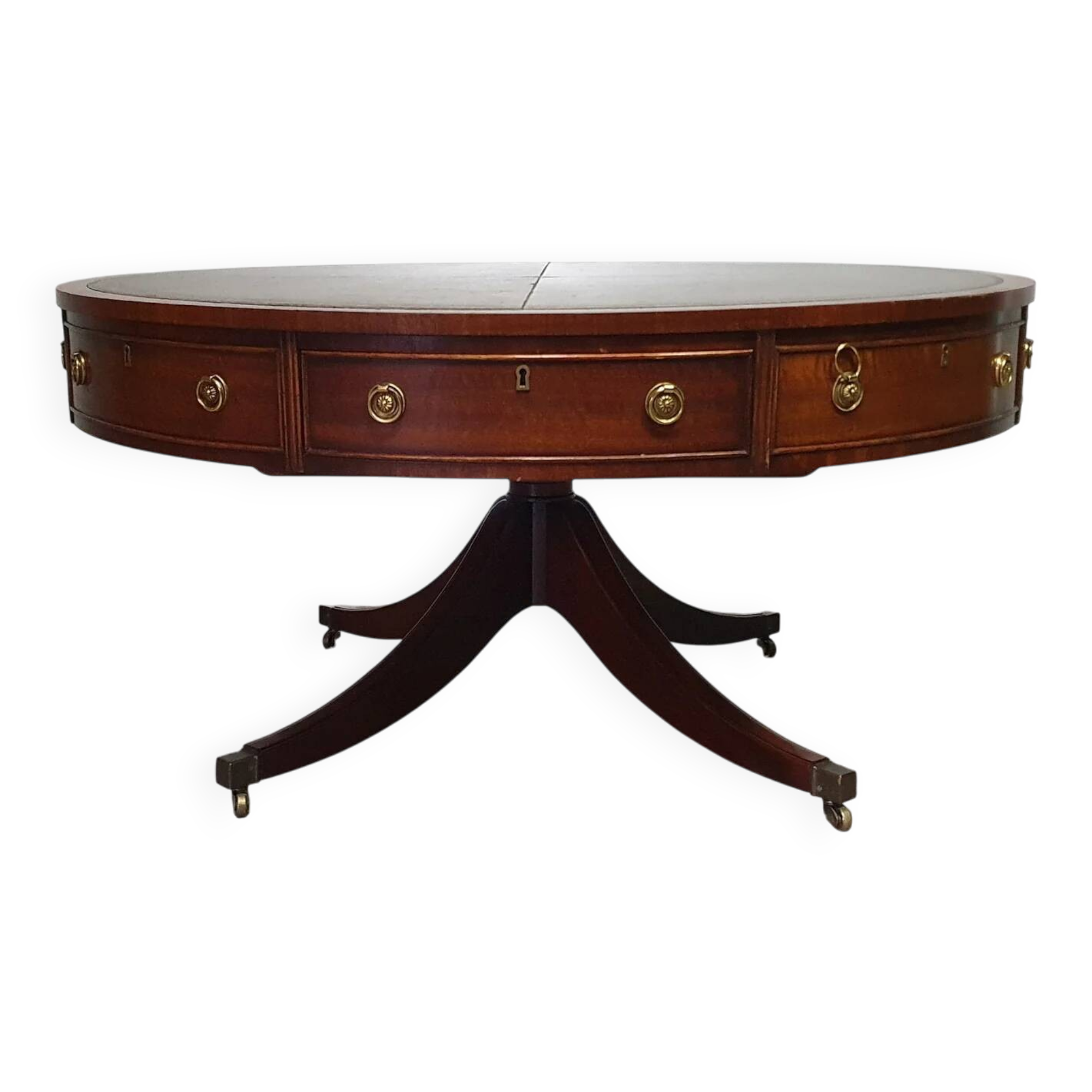 Table basse / table tambour victorienne « Heldense » en acajou avec plateau en cuir sur roulettes en laiton. Années 1980