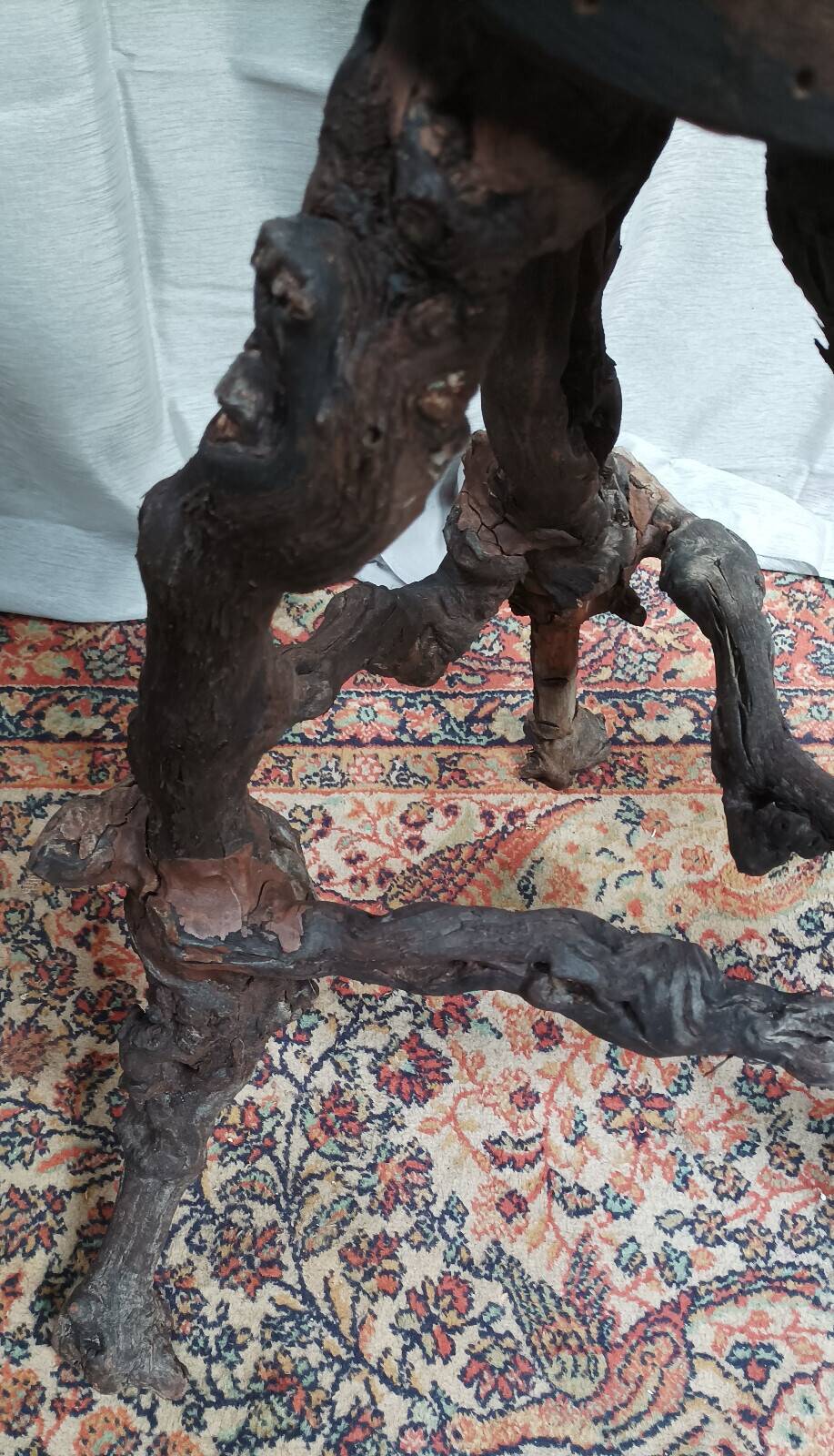 Brutalist bar stool made of vine wood