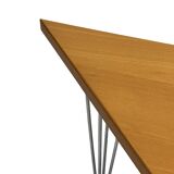 Vintage Danish triangular side table with hairpin legs design