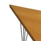 Vintage Danish triangular side table with hairpin legs design