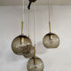 Vintage 70's cascade pendant 'brass globes' hanging lamp