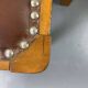 Pair of wooden and leather chairs