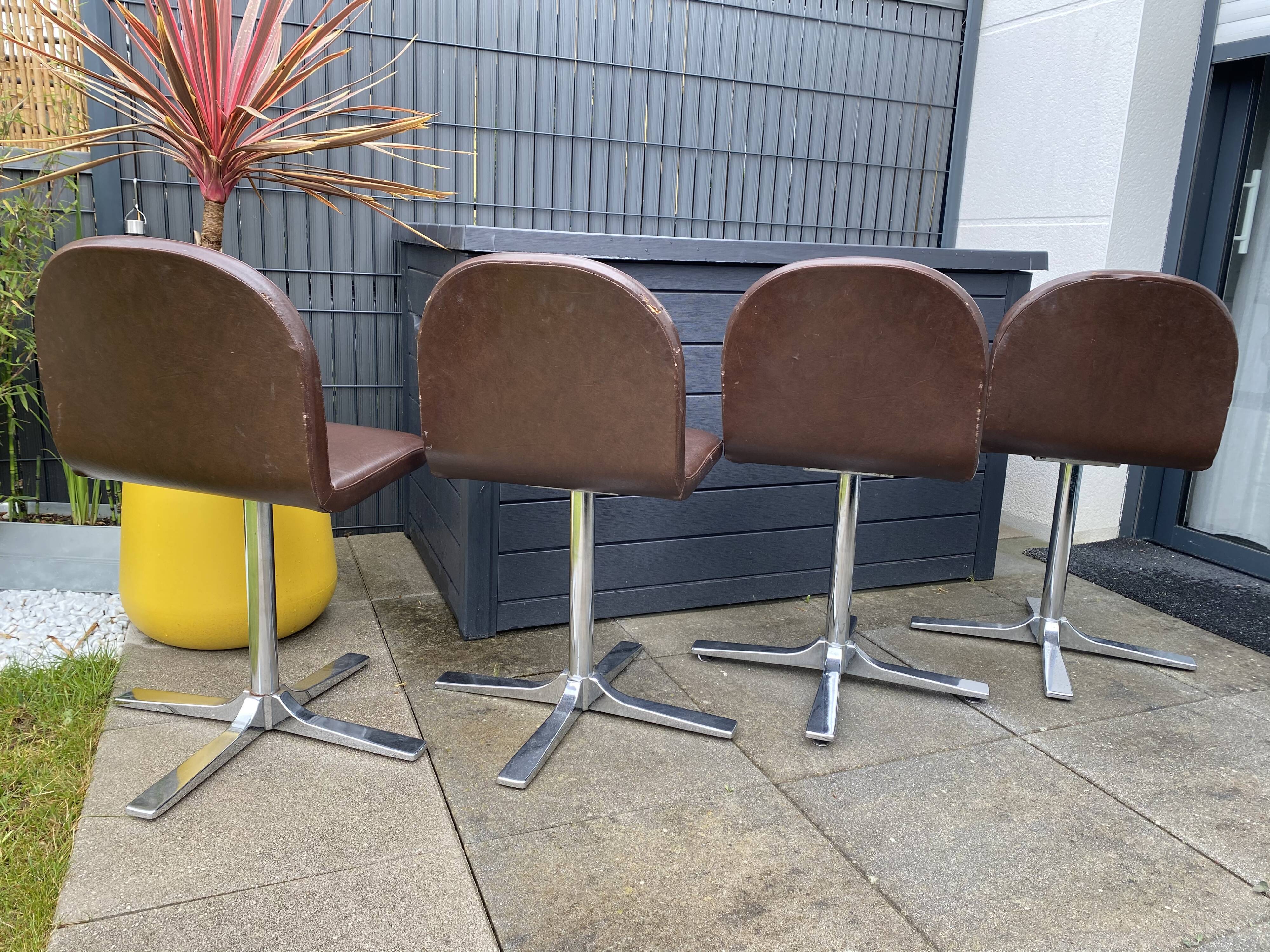 Suite of 4 Roche Bobois rotary chairs