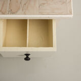 Small accent cabinet with drawers and swing doors