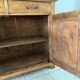 Antique dresser with glass doors and fleur-de-lys from the 50s