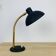 Vintage lamp from the 1950s in brass and black.